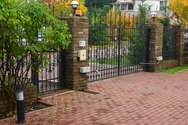 The view from the front yard to the automatic gate and electronics